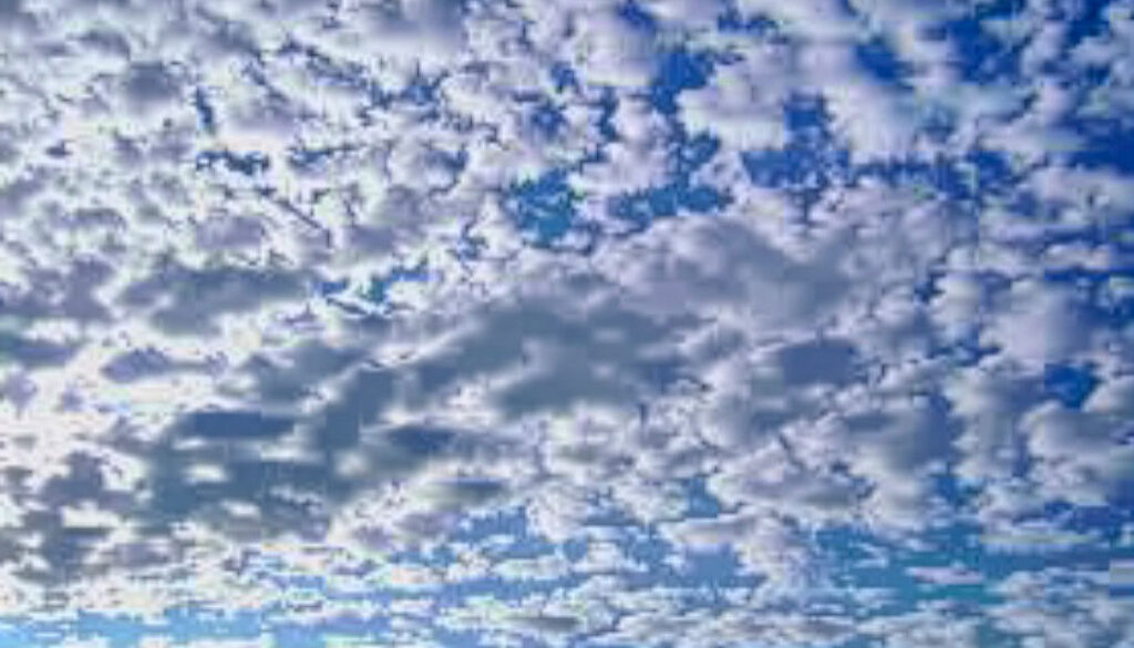 Scattered clouds or sand pile?