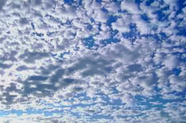 Scattered clouds or sand pile?